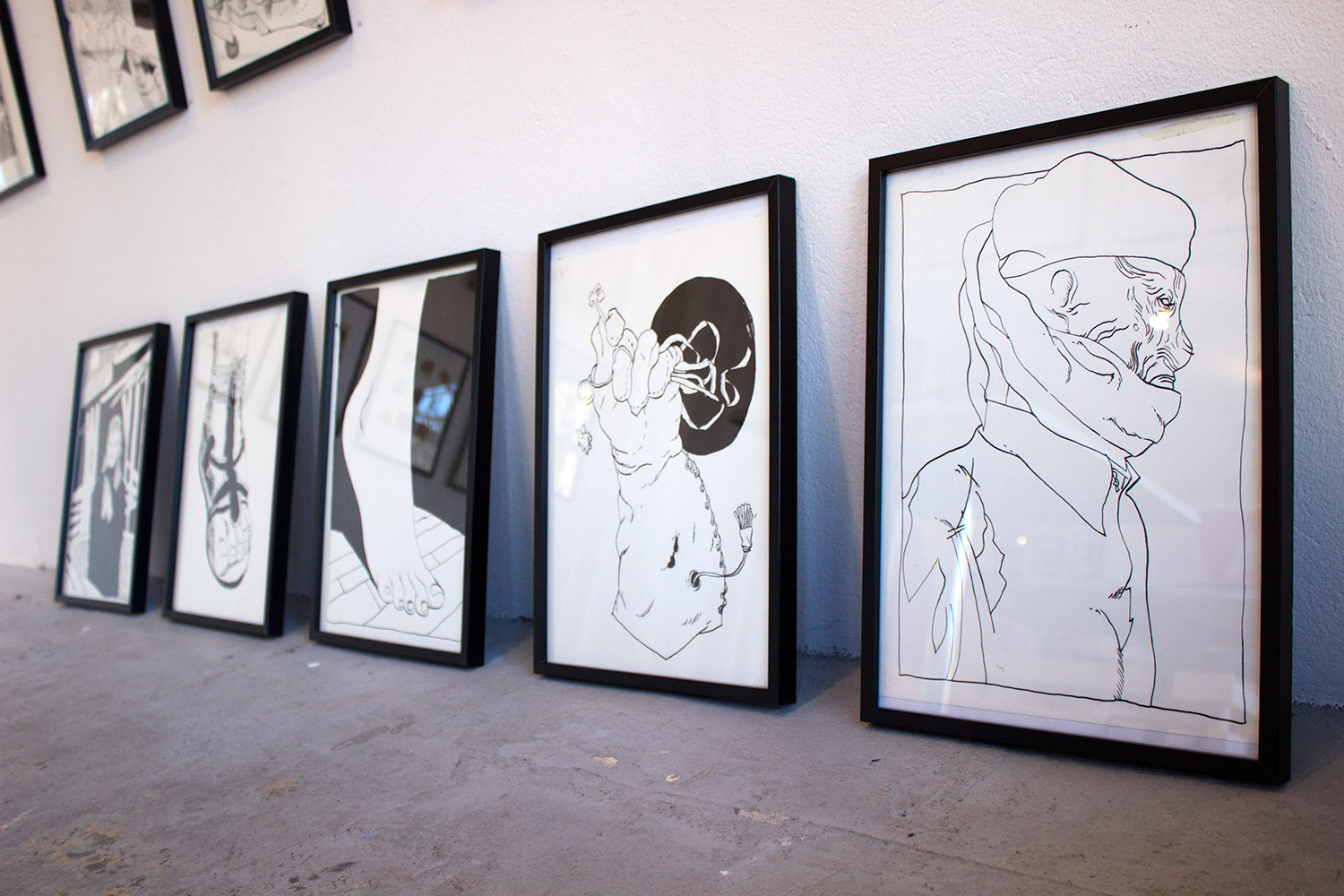 Original drawing by Halfdan Pisket. Framed in a classic black wooden frame with glass. Beauton Art Gallery - Paintings, drawings and illustraions. foot logo gladiator strong and expressive art illustrations and drawings, talented Danish illustrator, cartoonist