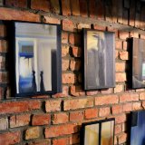 Windows IV | Paintings | Noemi Staniszewska | "Windows IV"
Original oil painting by Noemi Staniszewska
The Windows series is a pictorial tale of urban walks through the residential neighborhoods of the Hague. It is the result of observing the uncovered windows of Dutch houses, a recording of fragments of someone else's reality – intimate and yet exposed to public view.The window here is the boundary between private and foreign. It is a place where gazes meet, place of confrontation with what is outside. In this case, the situation of looking in the windows is also an expression of the emigration experience – the observer, although sees, remains outside of what he looks at, as always an outsider. Voyeurism is a manifestation of curiosity, perhaps longing, but at the same time it involves a violation of boundaries.
 | Beauton Art Gallery paintings, figurative, graphical, architecture, bodies, everyday life, patterns, black, brown, green, cotton-canvas, oil, architectural, beautiful, buildings, contemporary-art, decorative, design, interior, interior-design, modern, modern-art, windows, Buy original high quality art. Paintings, drawings, limited edition prints & posters by talented artists.