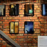 Windows I | Paintings | Noemi Staniszewska | "Windows I"
Original oil painting by Noemi Staniszewska
The Windows series is a pictorial tale of urban walks through the residential neighborhoods of the Hague. It is the result of observing the uncovered windows of Dutch houses, a recording of fragments of someone else's reality – intimate and yet exposed to public view.The window here is the boundary between private and foreign. It is a place where gazes meet, place of confrontation with what is outside. In this case, the situation of looking in the windows is also an expression of the emigration experience – the observer, although sees, remains outside of what he looks at, as always an outsider. Voyeurism is a manifestation of curiosity, perhaps longing, but at the same time it involves a violation of boundaries.
 | Beauton Art Gallery paintings, figurative, illustrative, minimalistic, architecture, everyday life, patterns, black, yellow, cotton-canvas, oil, architectural, beautiful, buildings, contemporary-art, decorative, design, interior, interior-design, modern, modern-art, windows, Buy original high quality art. Paintings, drawings, limited edition prints & posters by talented artists.